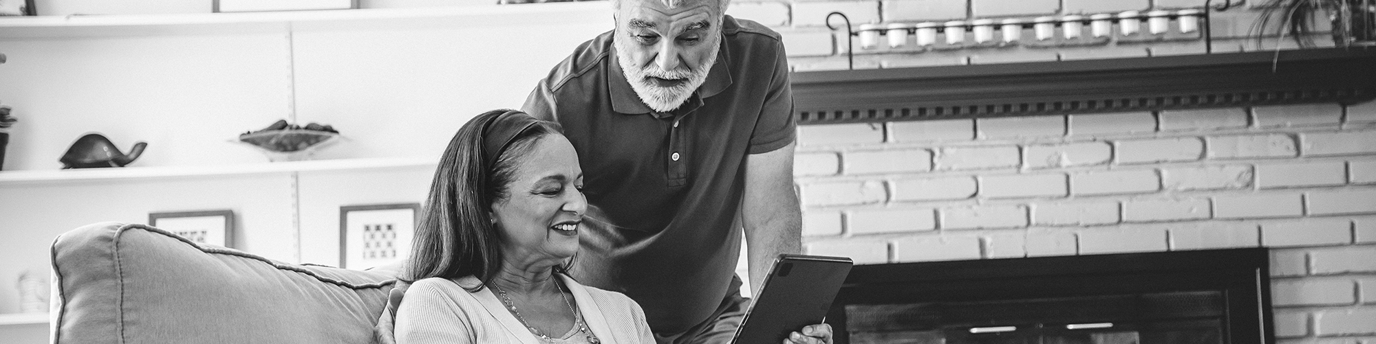 woman & man looking at tablet