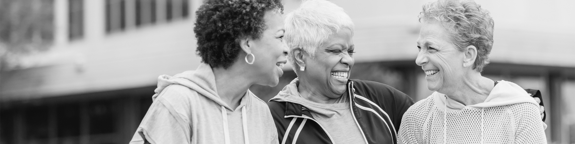 women smiling at eachother