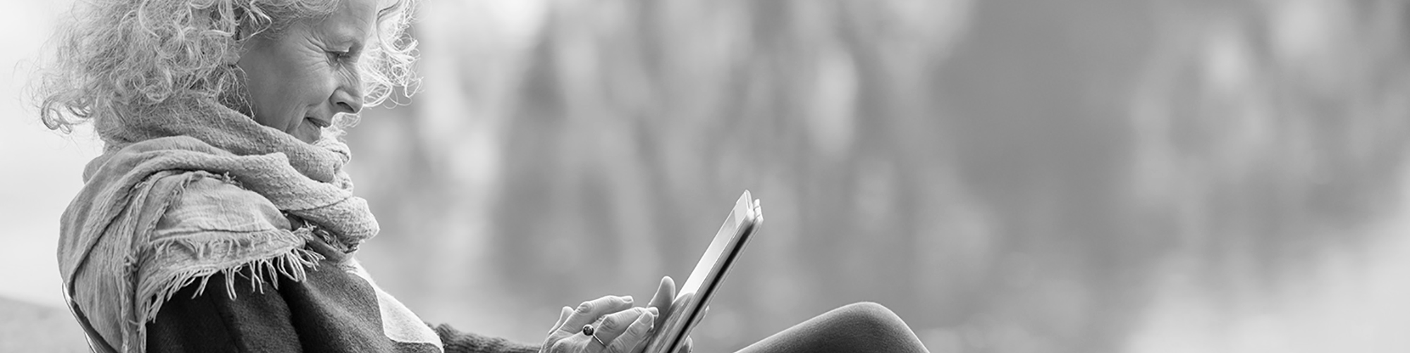 Woman reading tablet